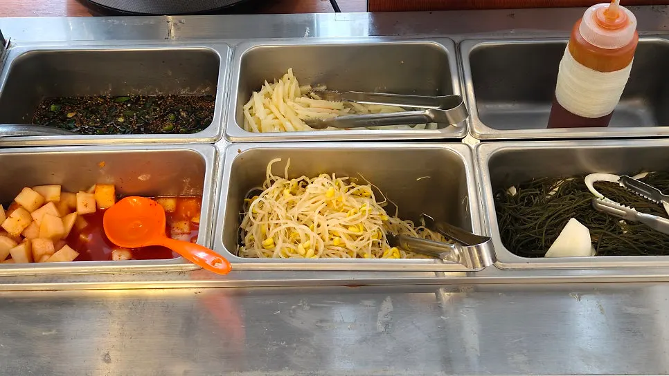 Self-serve side dish corner where you take as much as you need