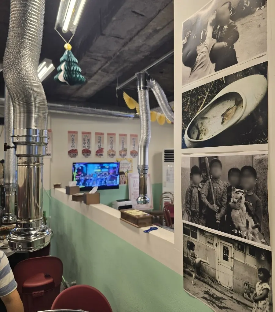 Restaurant interior evoking a 1990s street food tent