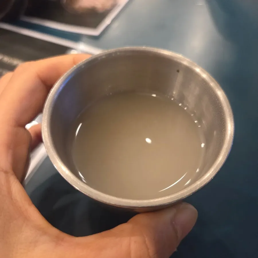 Self-serve bar with unlimited broth and rice at Myeongyeok