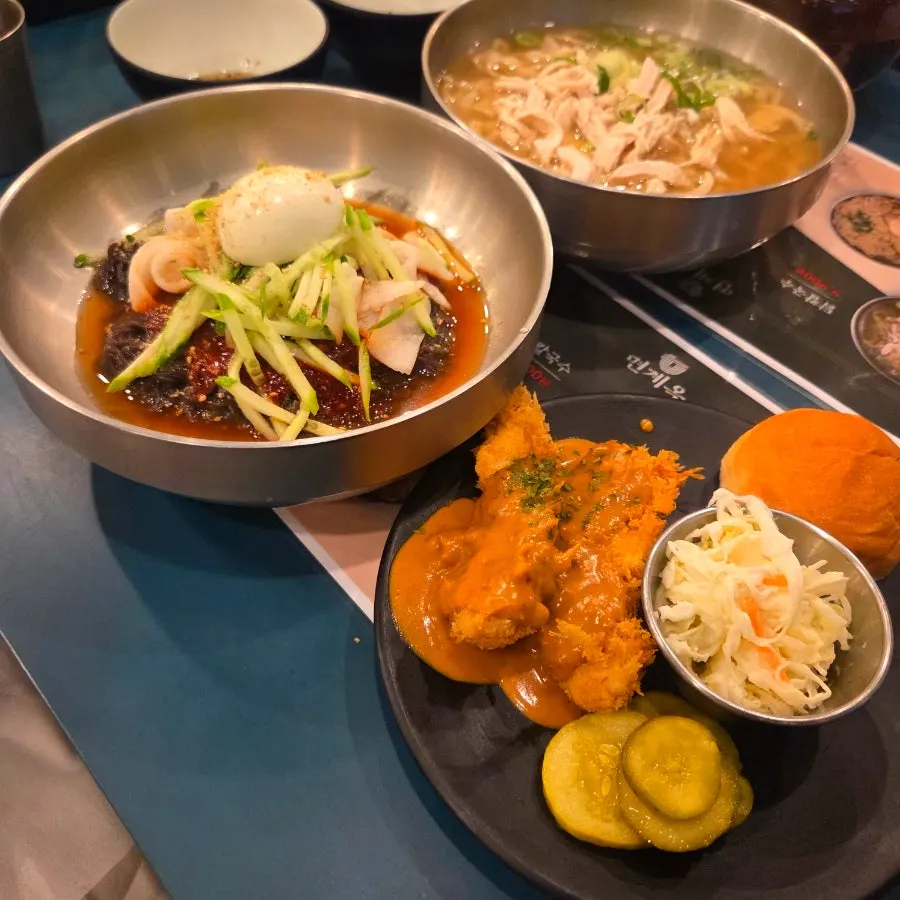 Full table spread set up for a family meal at Myeongyeok
