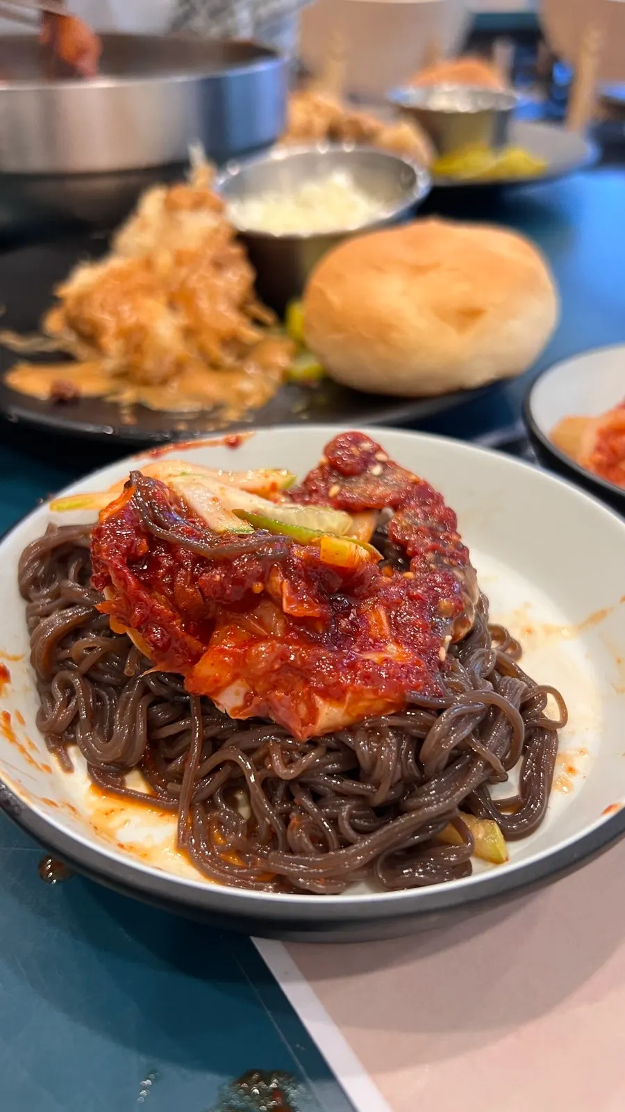 Close-up of noodles and crab meat in the spicy crab bibim naengmyeon