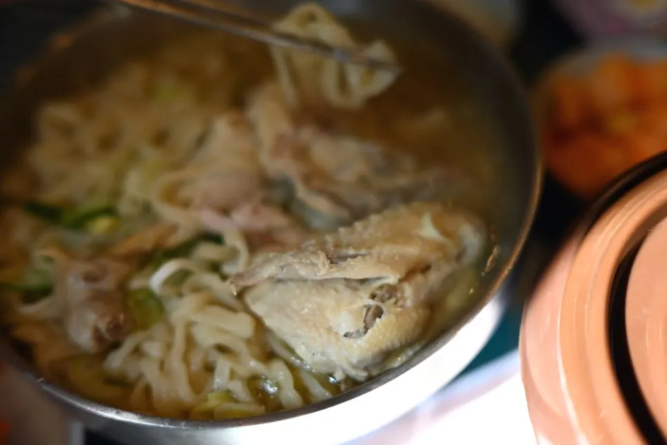 A full bowl of mul-naengmyeon at Myeongyeok