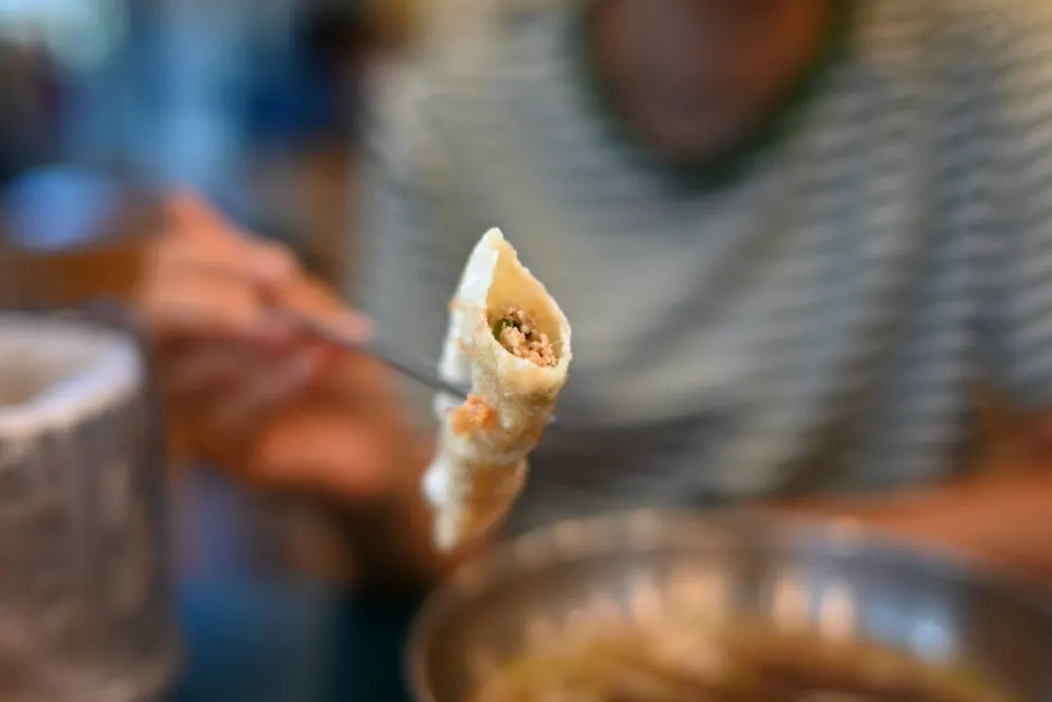 Cross-section of soft chicken tenderloin katsu