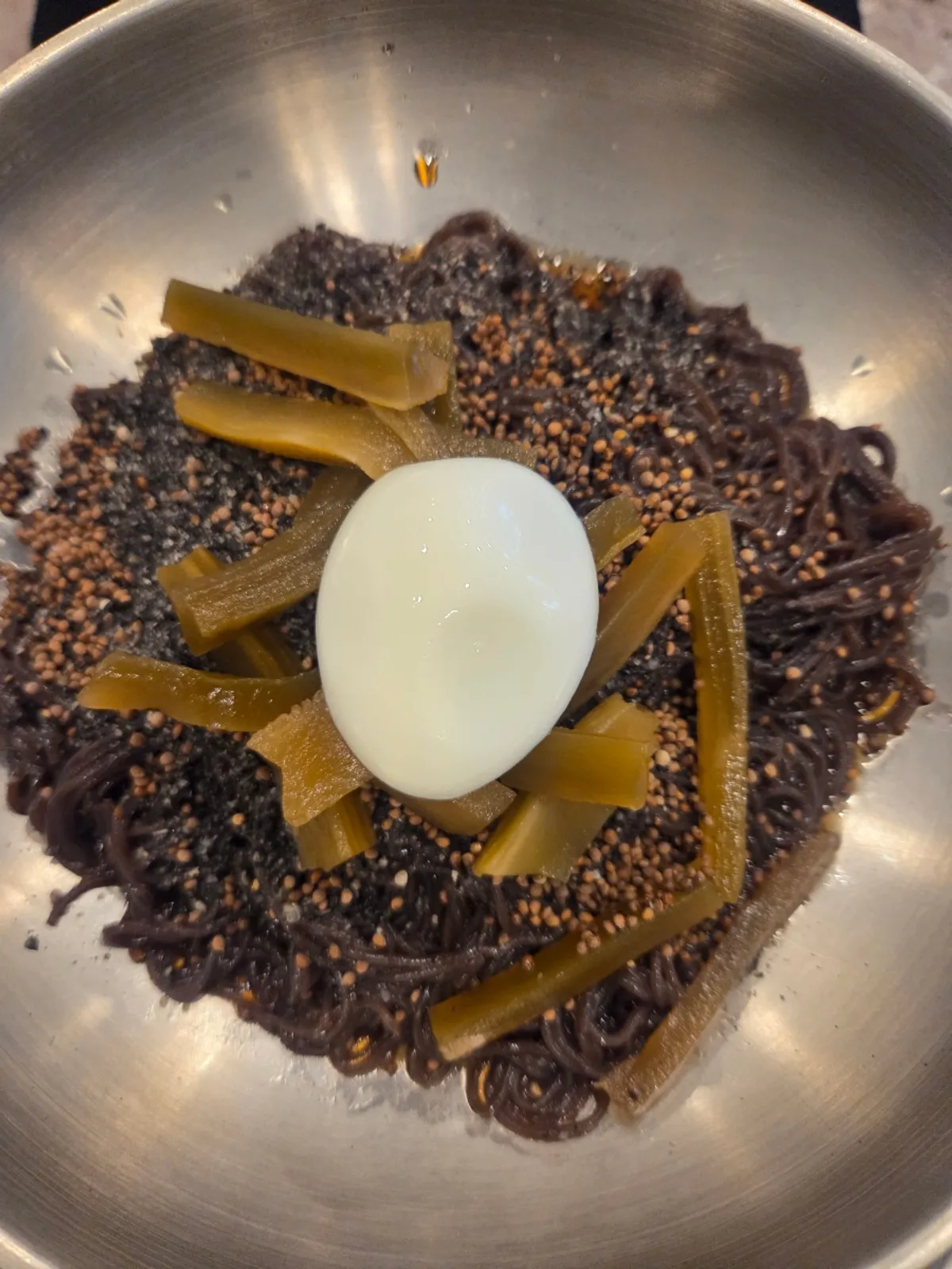 A bowl of Myeongyeok's perilla oil cold noodles