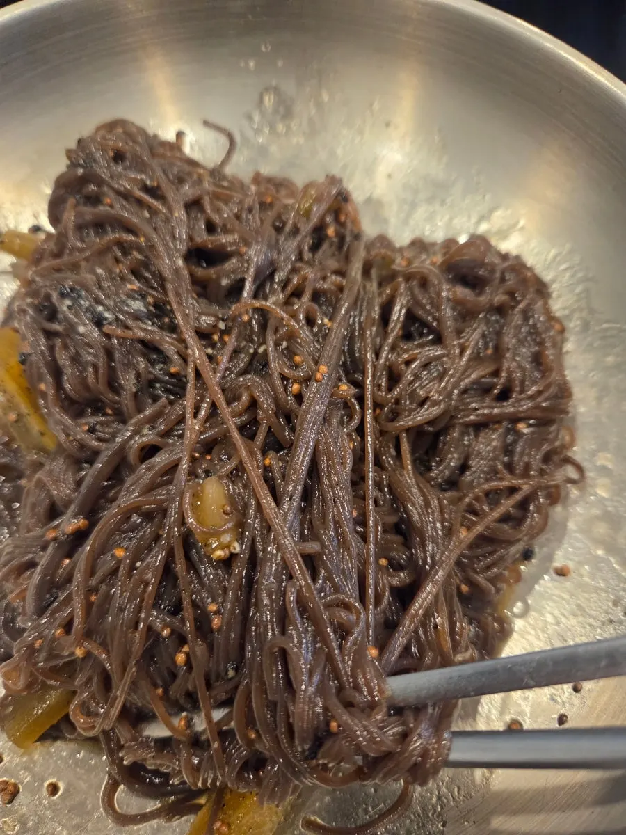 Close-up of the toppings on the perilla oil cold noodles