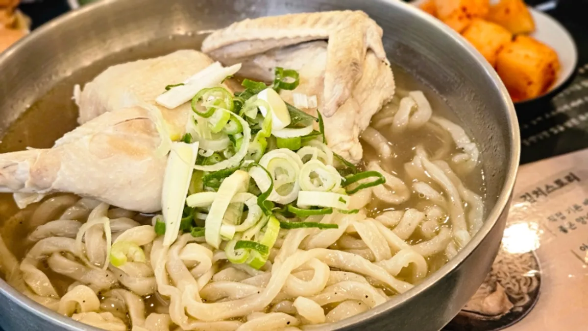 Myeongyeok's chicken kalguksu with half a chicken inside