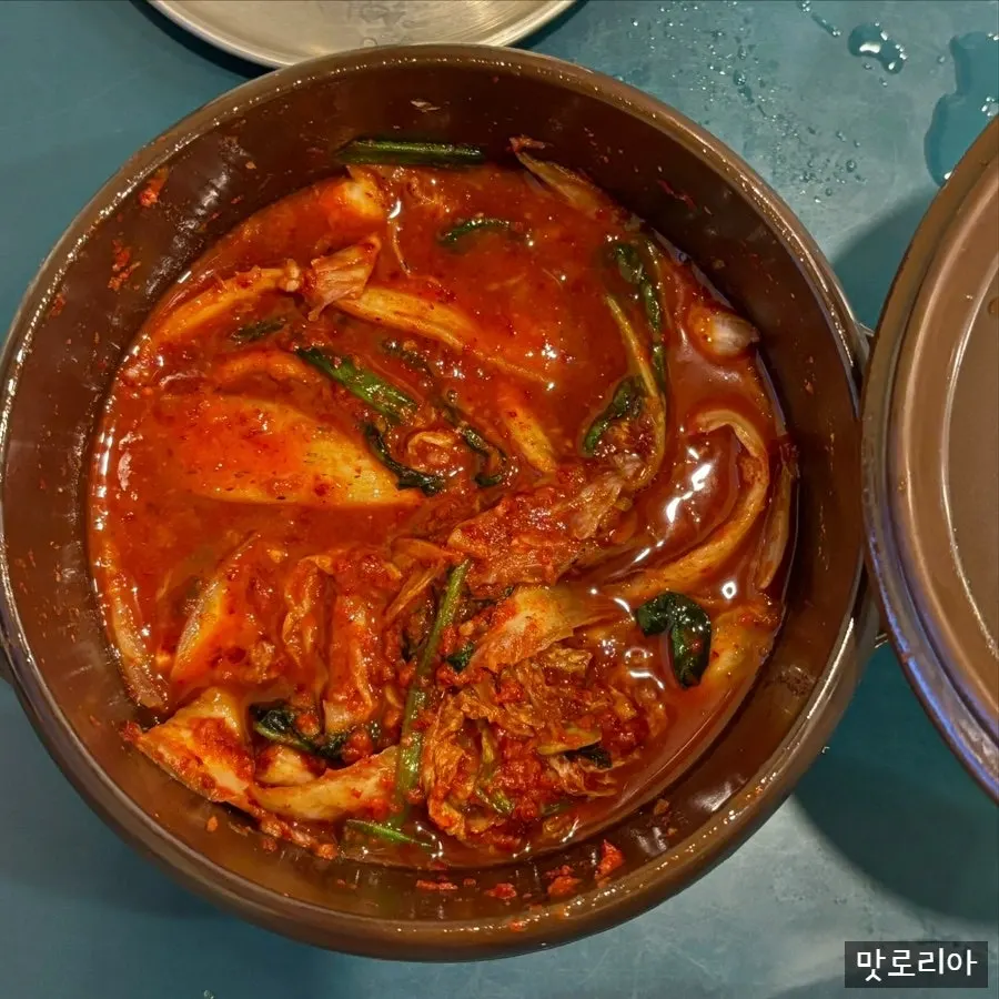 A plate of house-made napa cabbage kimchi