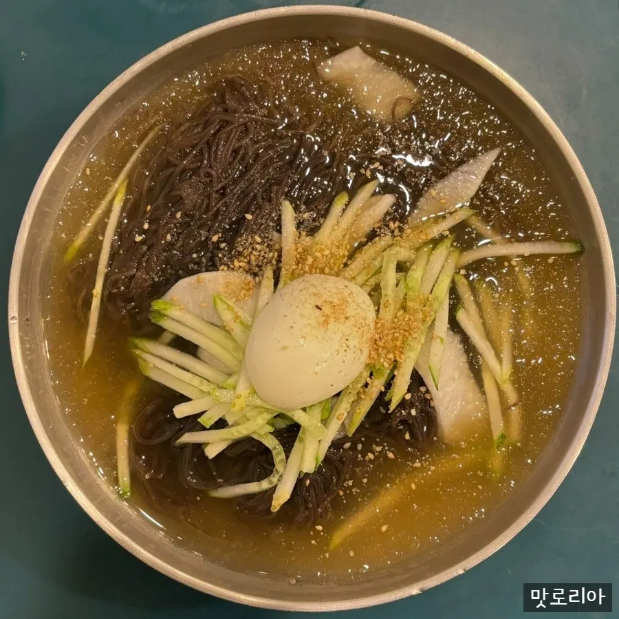 Table setting with mul naengmyeon and chicken tenderloin katsu set