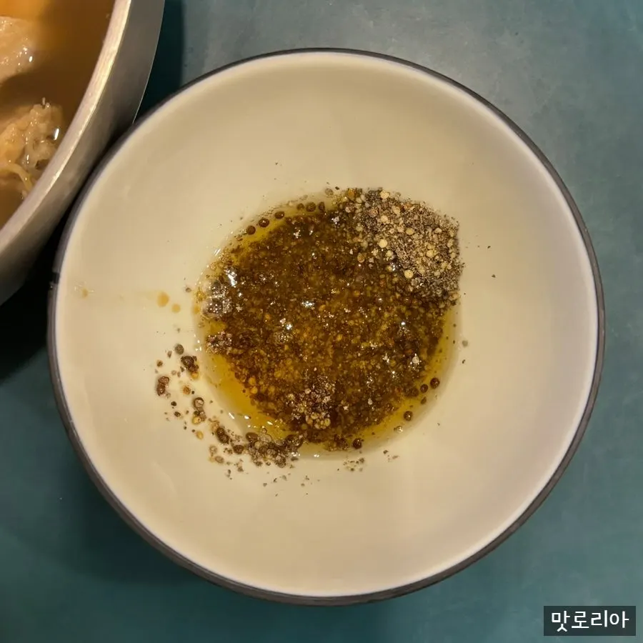 Half-chicken kalguksu with perilla oil sauce