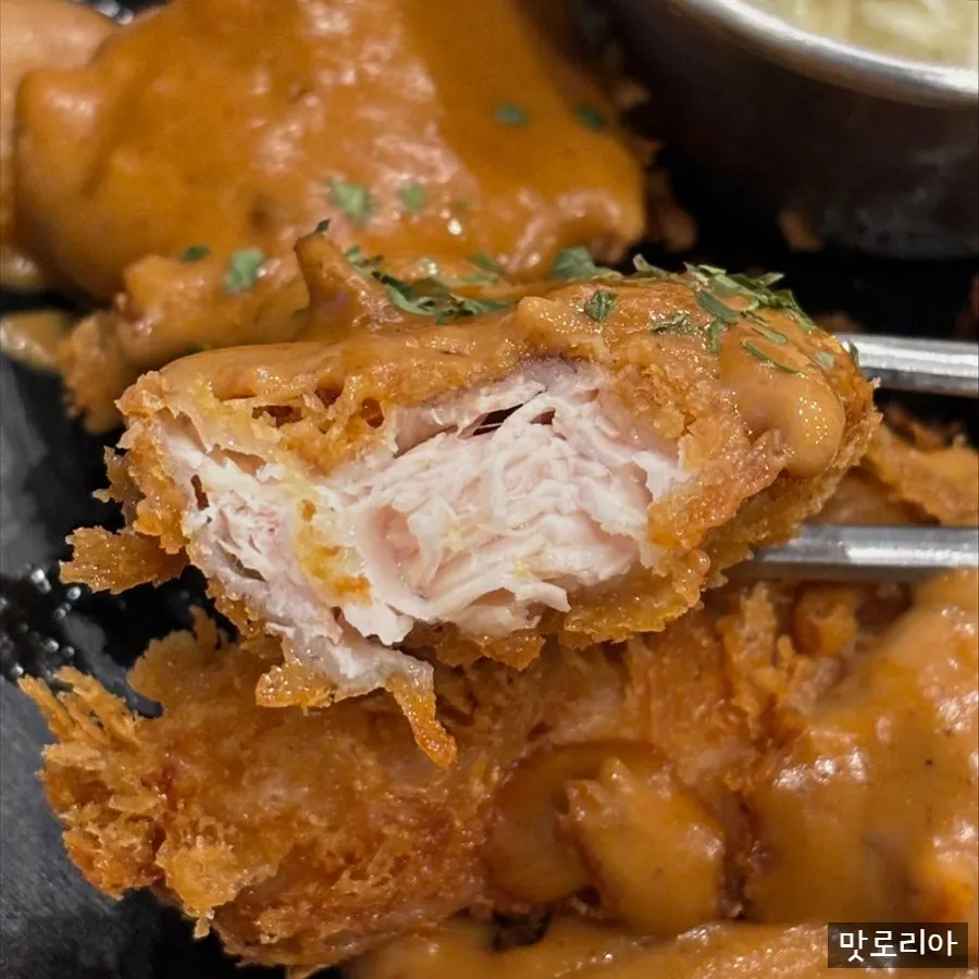 Cross-section of crispy chicken tenderloin katsu