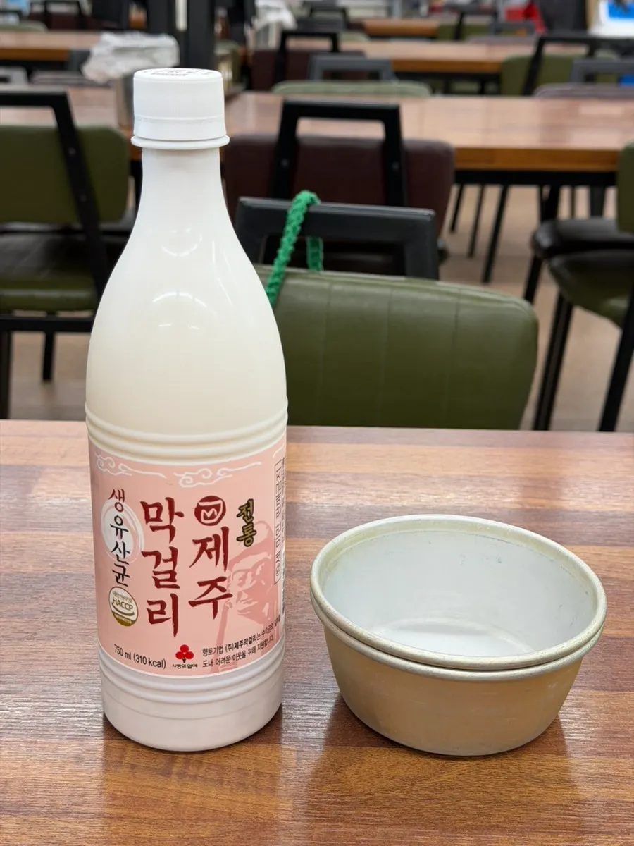 Jeju makgeolli ordered as a drink alongside the noodles