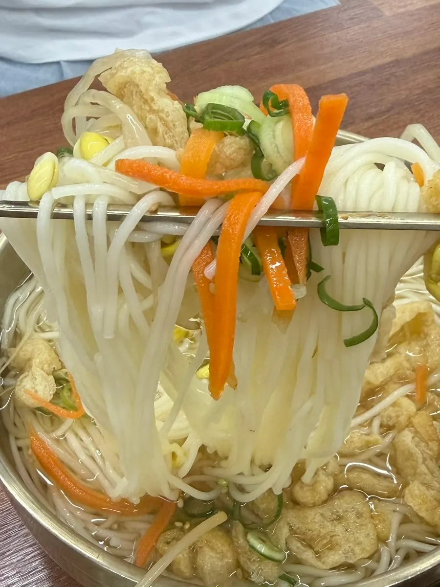 Dongnam noodles visible in the anchovy guksu