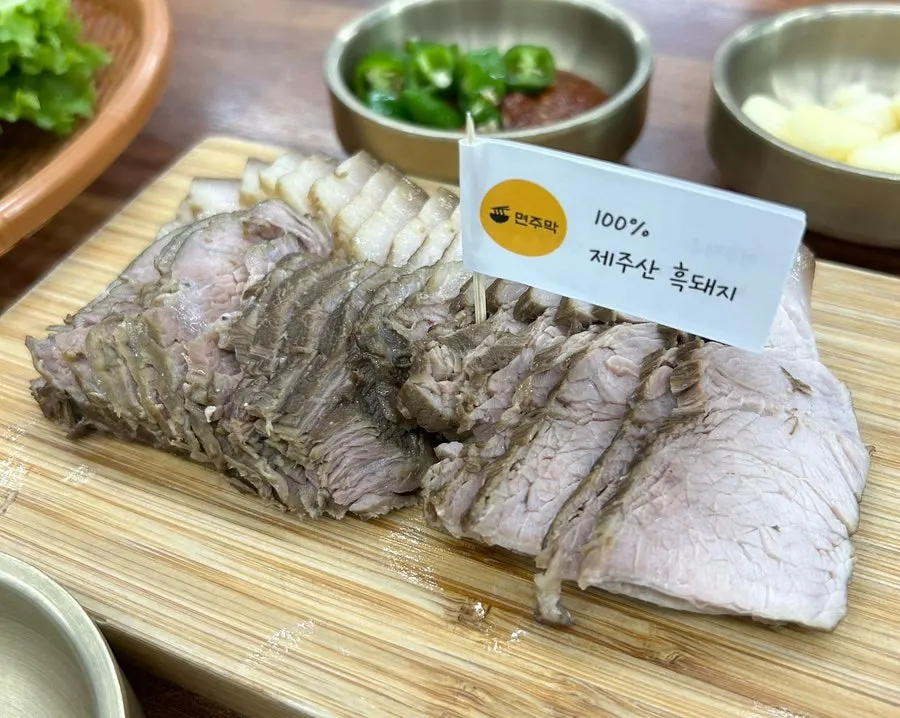 A half-size plate of Jeju black pork dombe pork