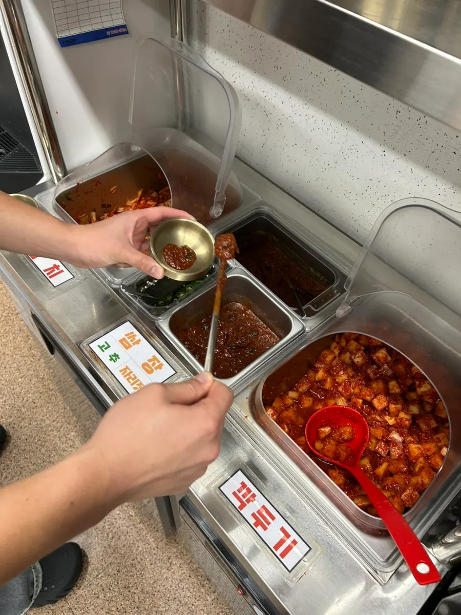 Self-serve side dish bar at Myeonjumak Jeju Main Branch