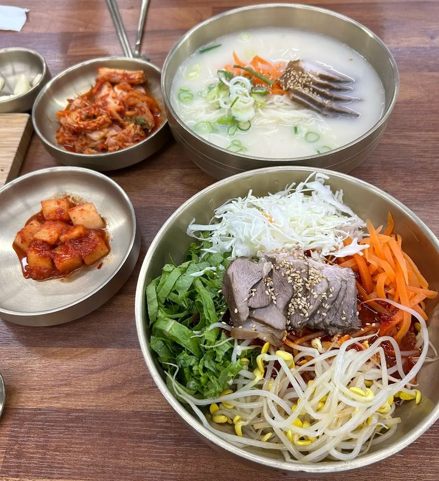 Side dishes and anchovy broth ready at the self-serve bar
