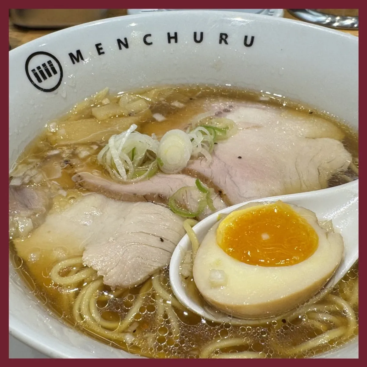Shoyu ramen topped with chashu and a soft-boiled egg