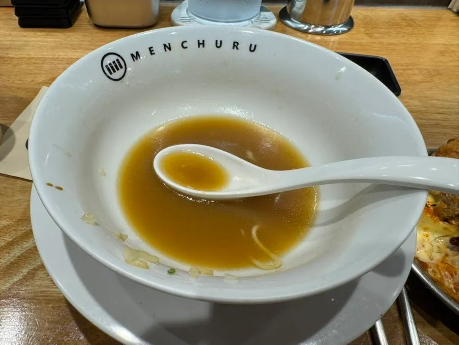 An emptied ramen bowl