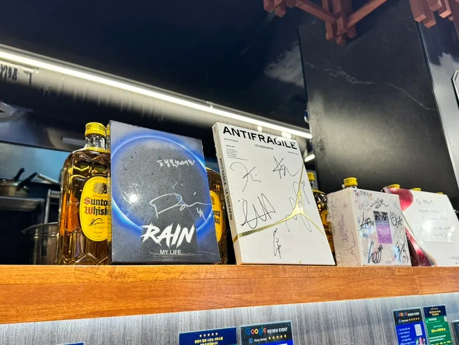 Albums and interior décor displayed in the restaurant