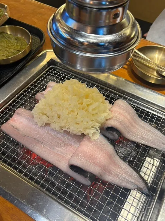 Sauces and shredded ginger at the self-serve bar