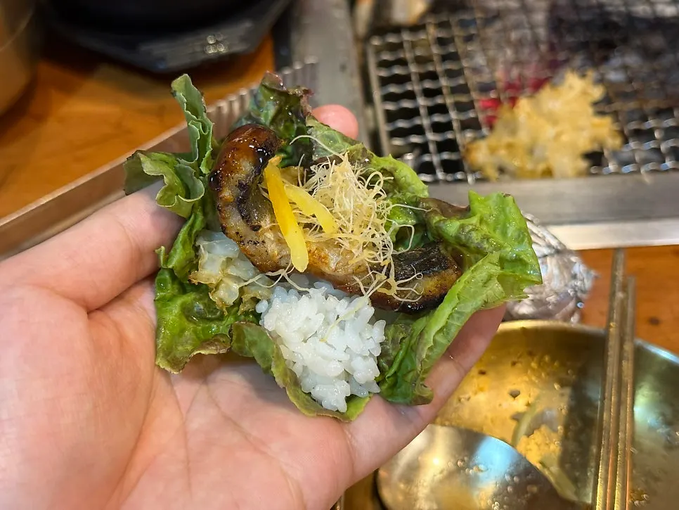 Eel wrap topped with snow mushroom and wild ginseng root