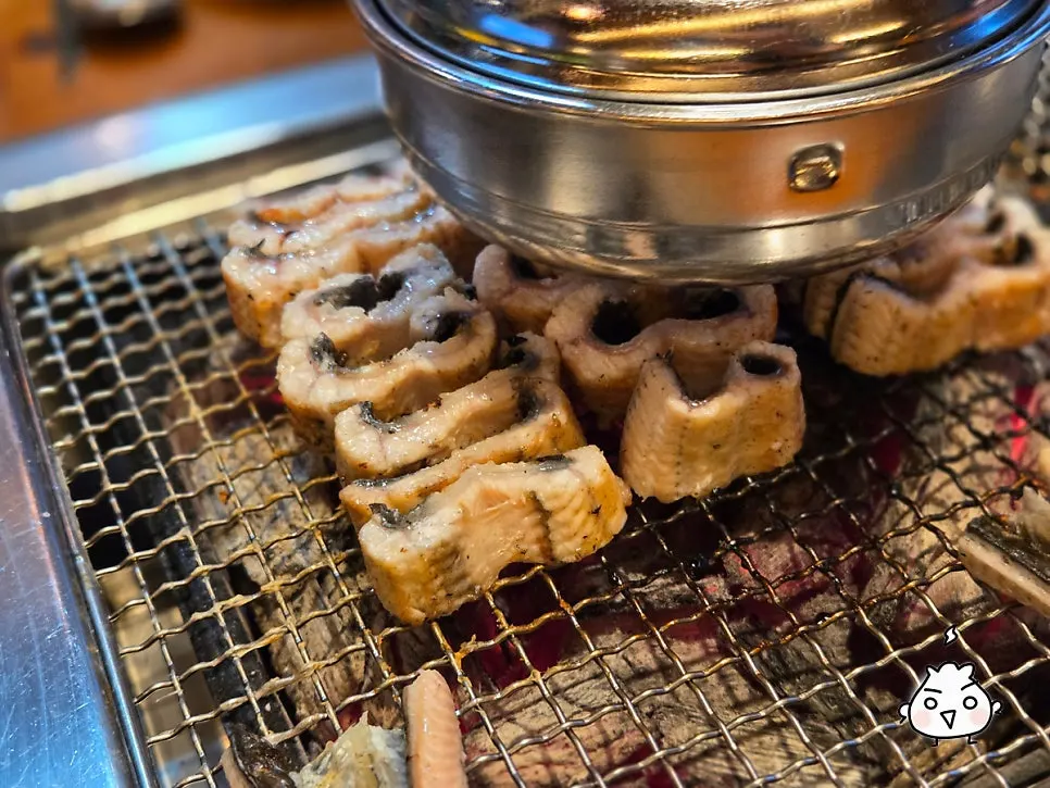 Large snow mushroom grilled alongside the eel