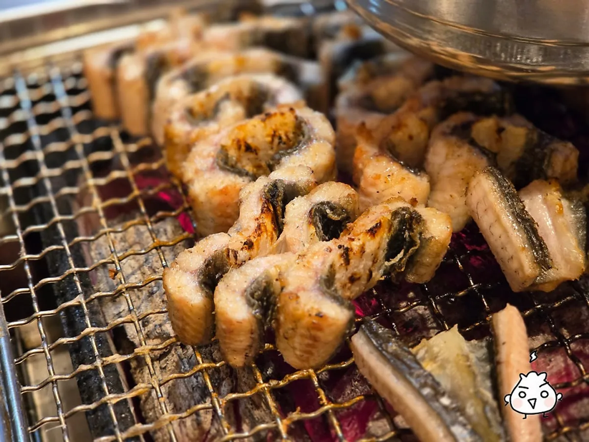 Eel and side dishes laid out together on the table