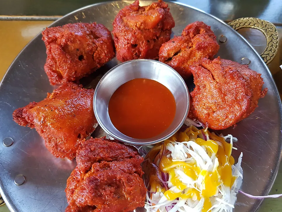 Close-up of Set B's curry and naan