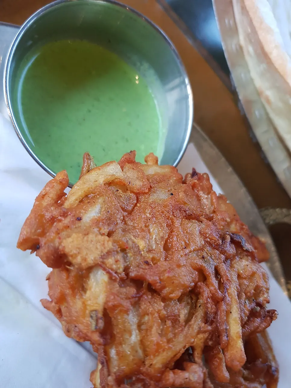 Vegetable fritters served with sauce