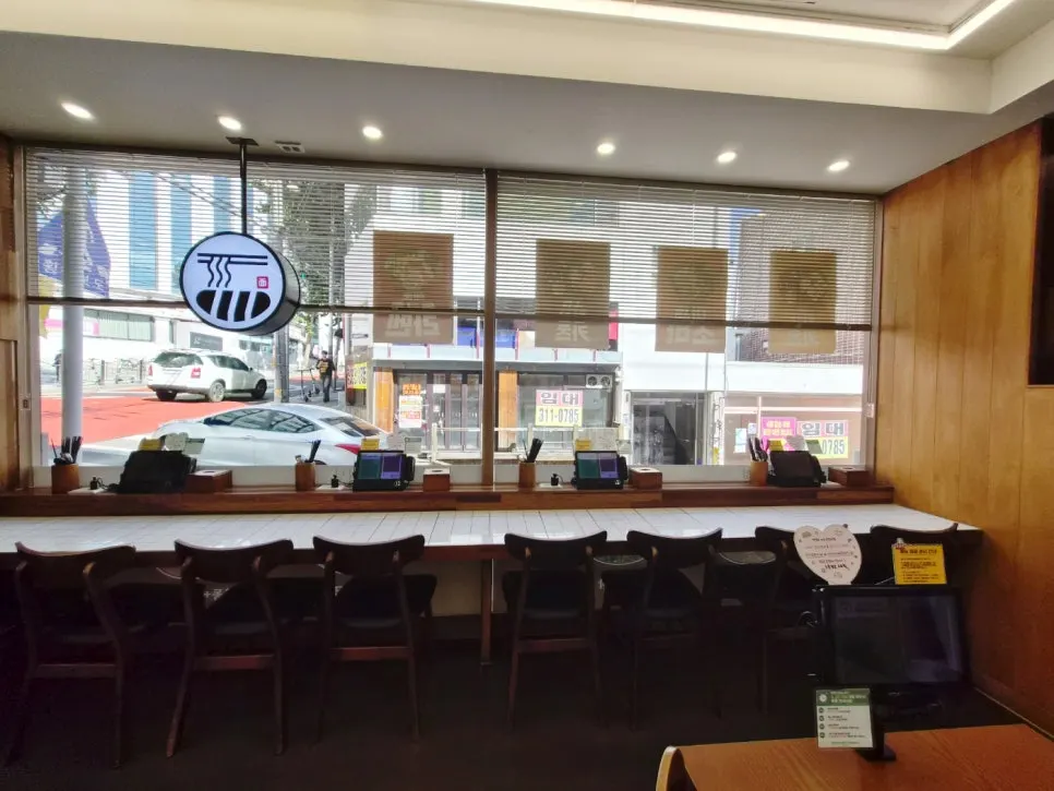 Interior of Myeonsikdang with sunlight streaming in at opening time