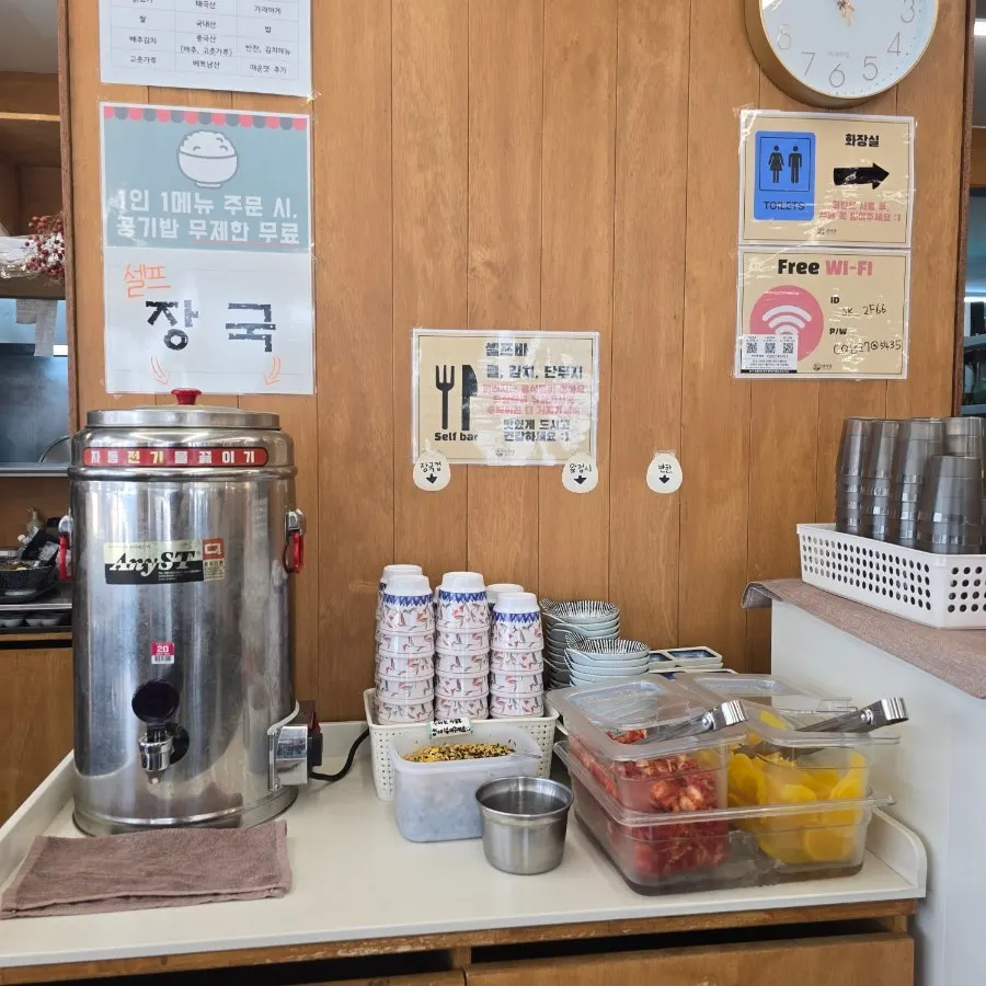 Interior of Myeonsikdang Daegu Bogeondae with wide table spacing