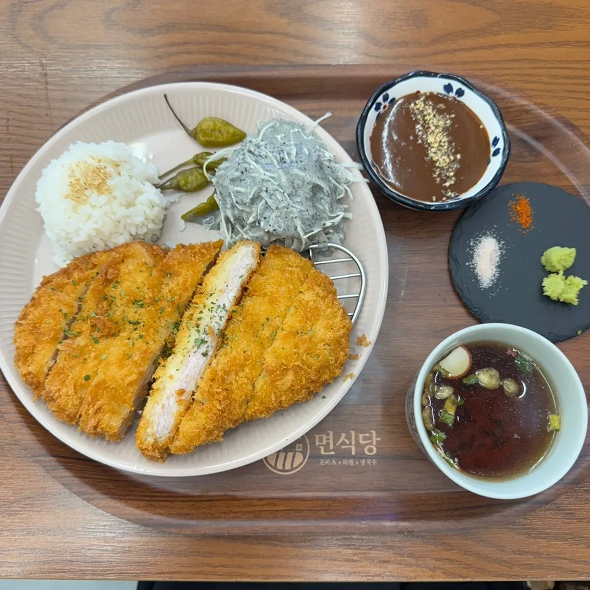 Full table spread of the handmade pork loin katsu