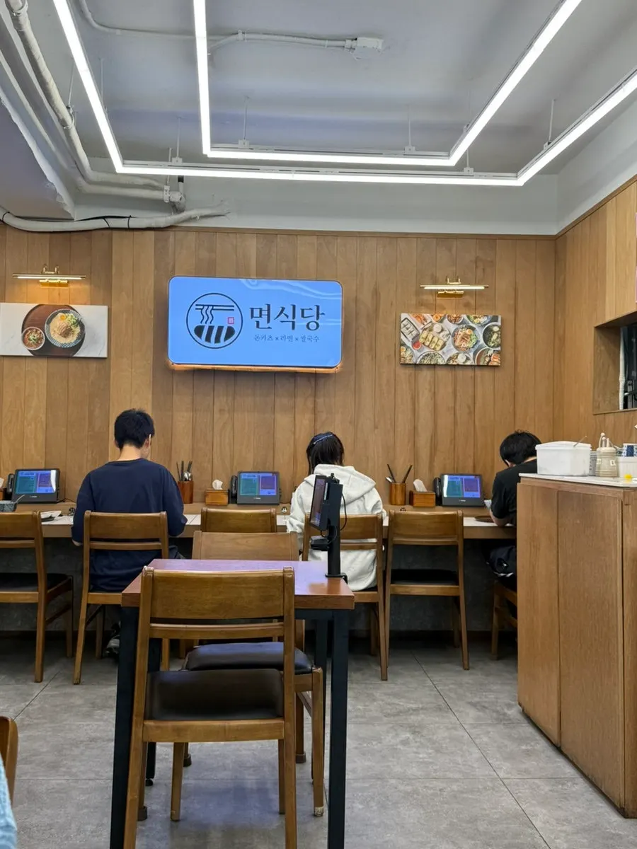 Entrance to the 2nd-floor Myeon Sikdang Hongik University Branch in Hongdae