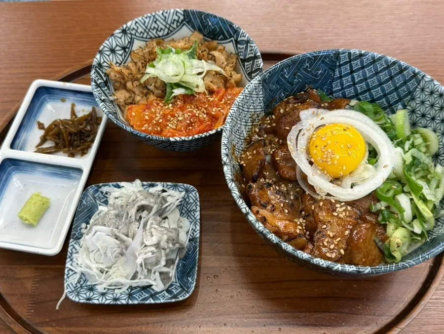 Spicy galbi rice bowl topped with an egg yolk