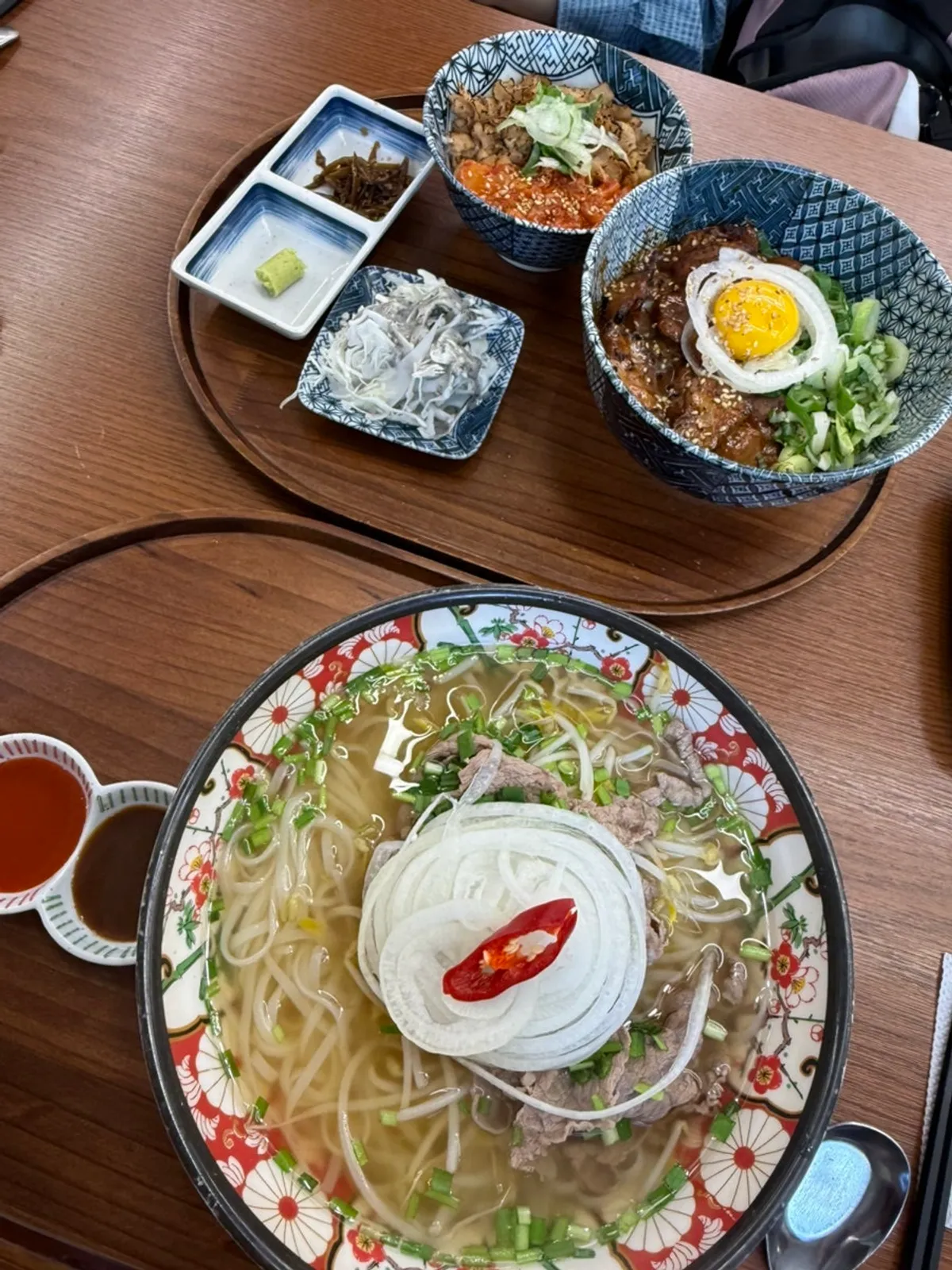 Table spread with noodle dish and sides together