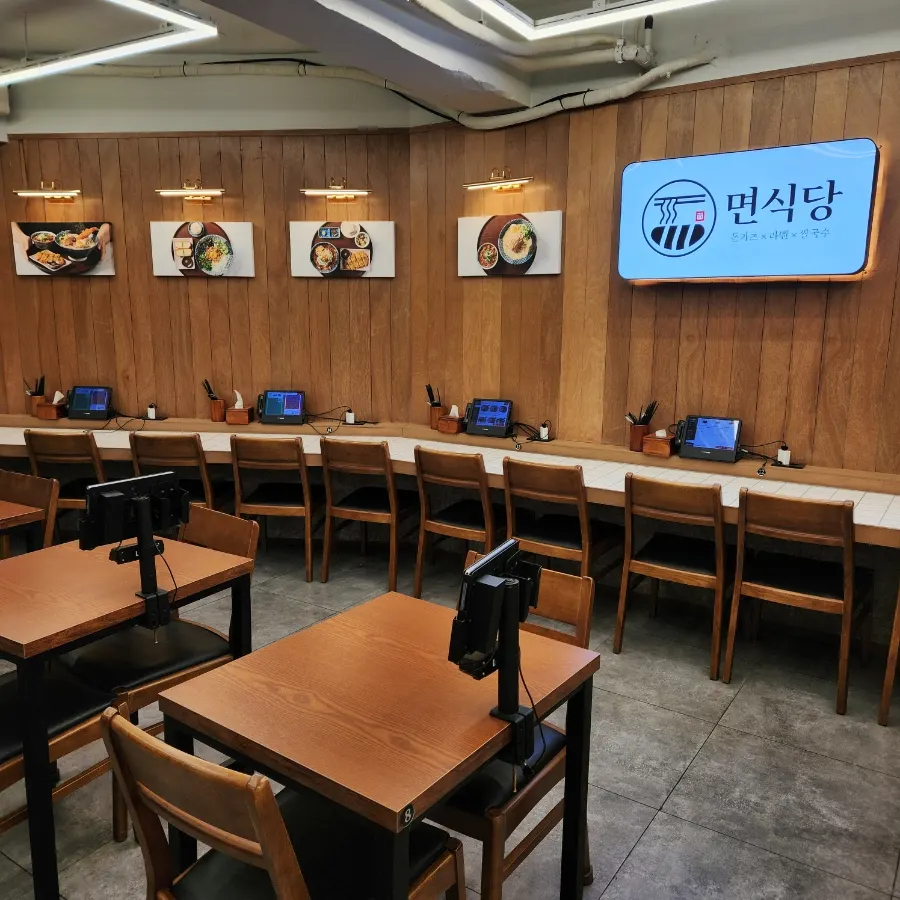 Interior of Myeon Sikdang Hongik University branch with plenty of solo dining seats