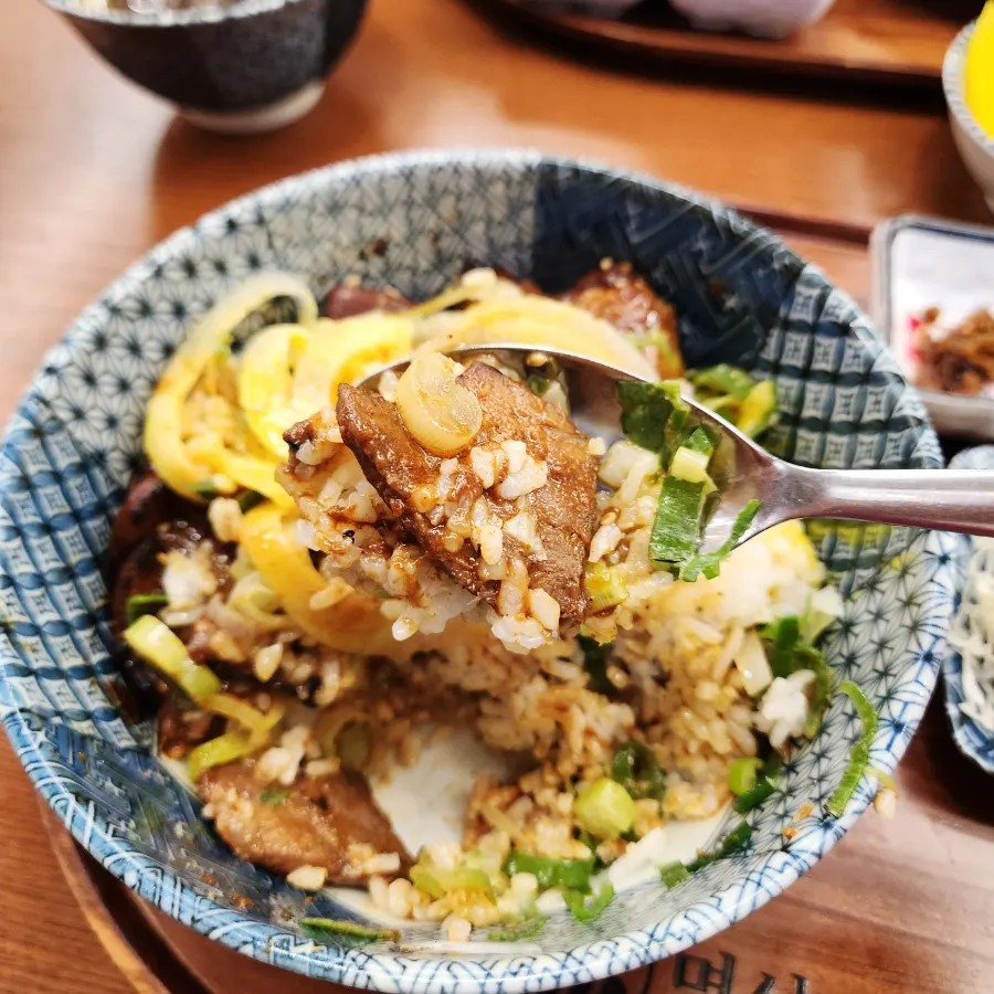 Close-up of the spicy galbi rice bowl piled high with meat