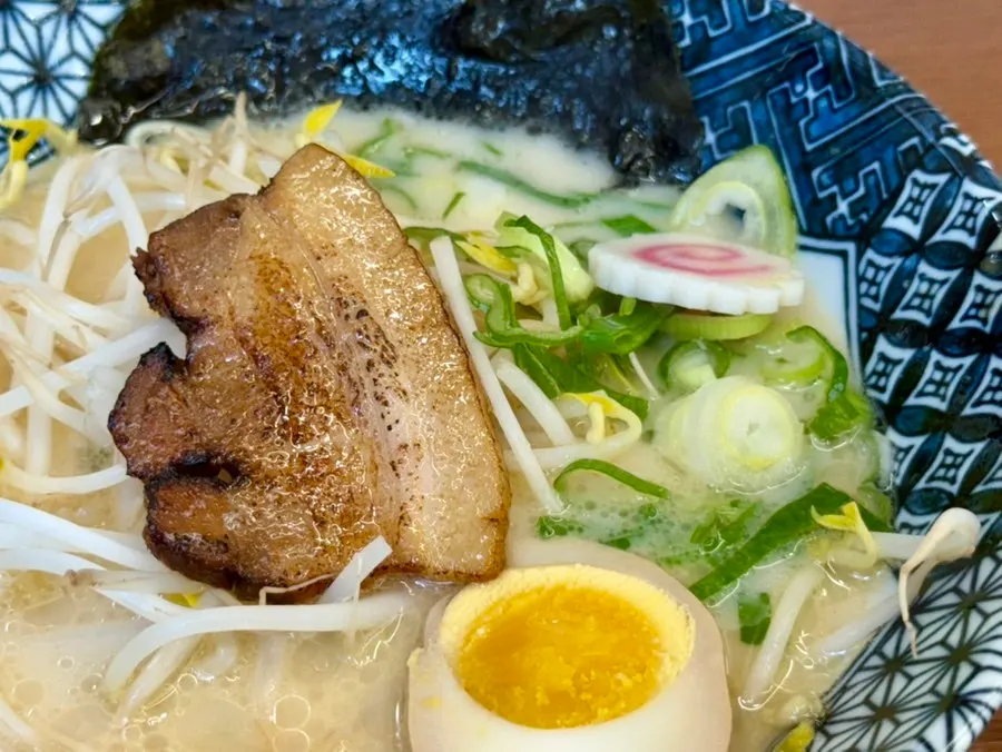 Tonkotsu ramen topped with chashu and soft-boiled egg
