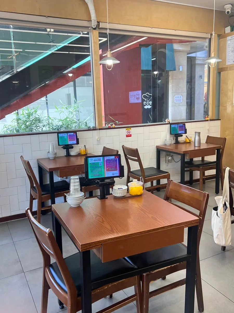 Interior of Myeonsikdang with window-side single seats