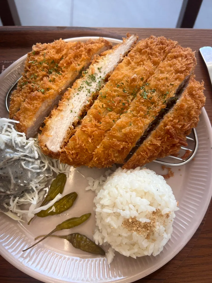 Curry rice served alongside the pork loin katsu
