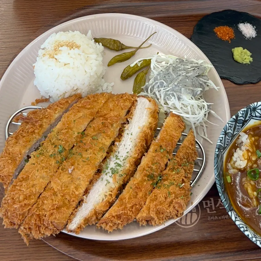Table spread featuring both ramen and tonkatsu