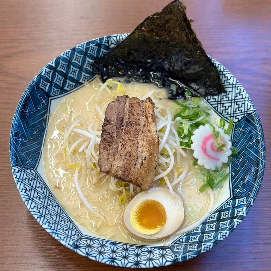 Tonkotsu ramen topped with bean sprouts and char siu