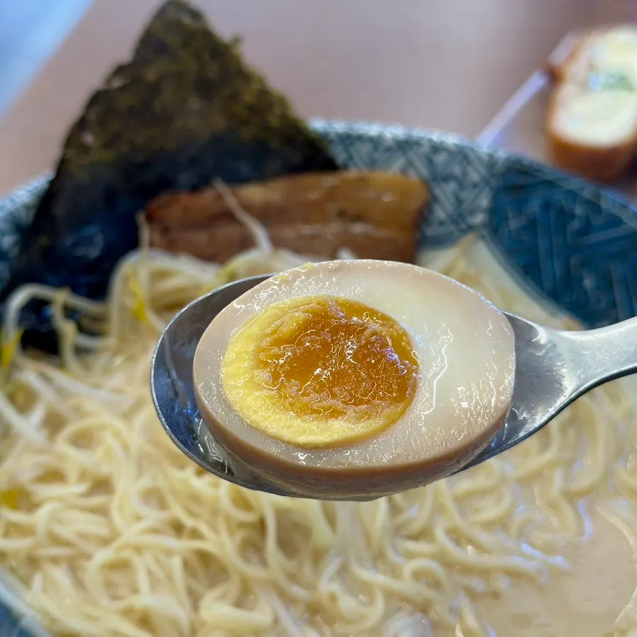 A steaming bowl of tonkotsu ramen