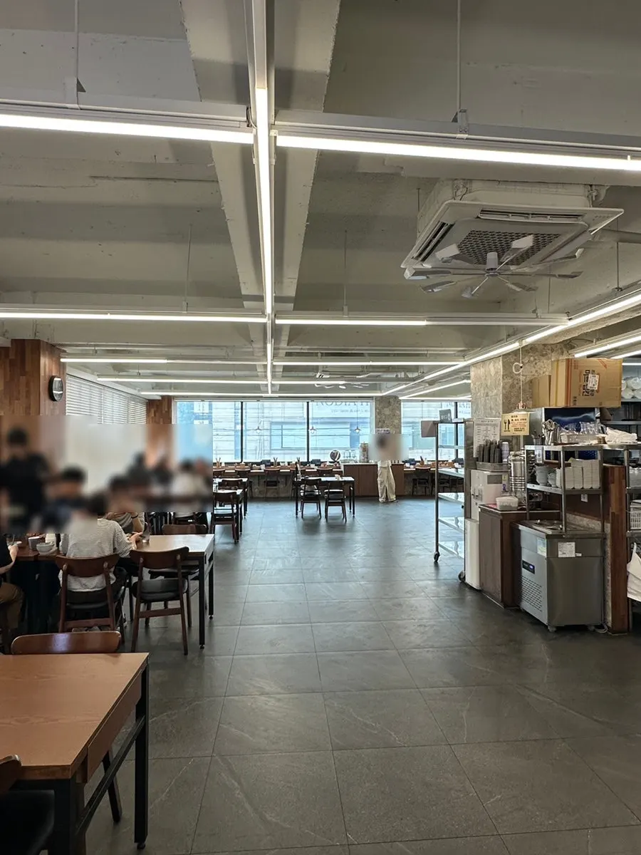 Spacious interior and tables at Myeonsikdang Keimyung University Branch
