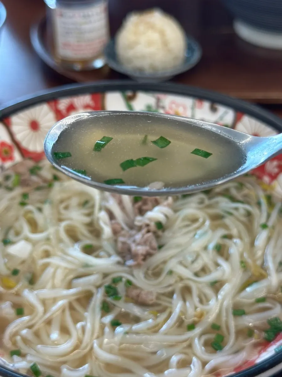 Close-up of meat and bean sprouts in the shabu pho