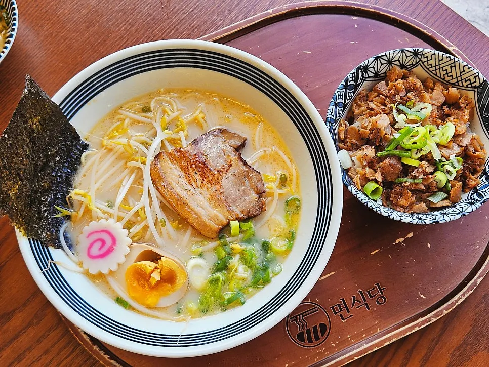 A bowl of tonkotsu ramen at Myeonsikdang Keimyung University Branch