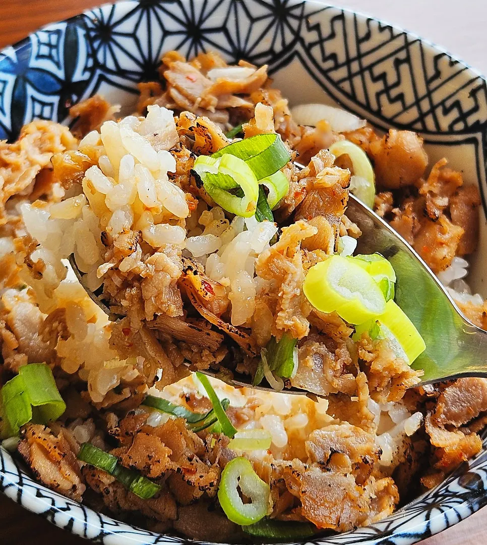 Close-up of mini buta-don topped with special sauce