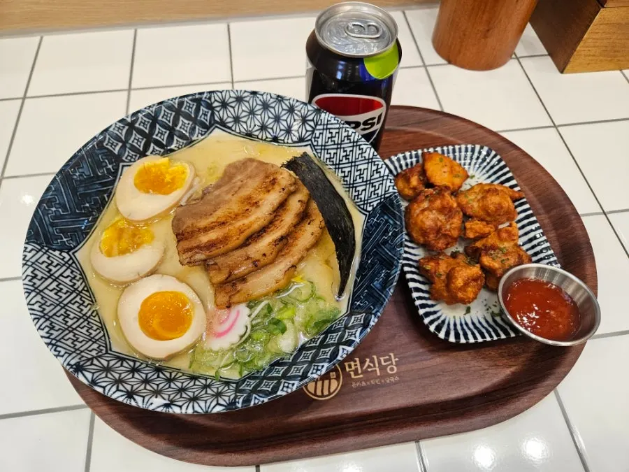 Premium tonkotsu ramen topped with chashu and soft-boiled egg
