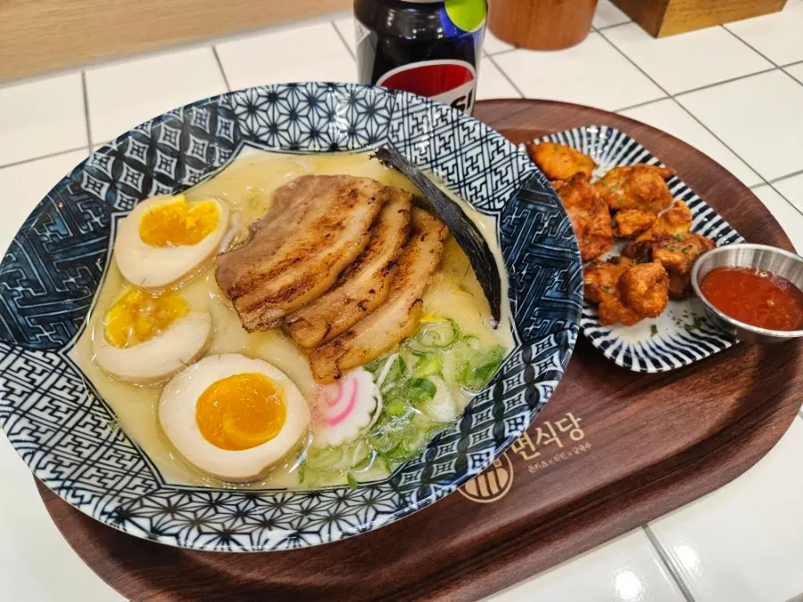 A solo dining spread of ramen and karaage