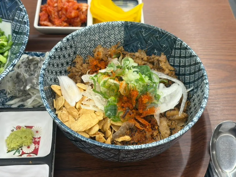 Ordered butadon with side dishes on the table