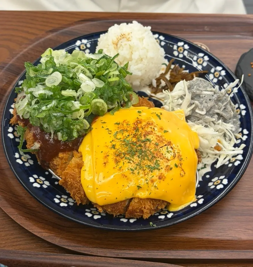 A chopstick-full of lifted mazesoba noodles